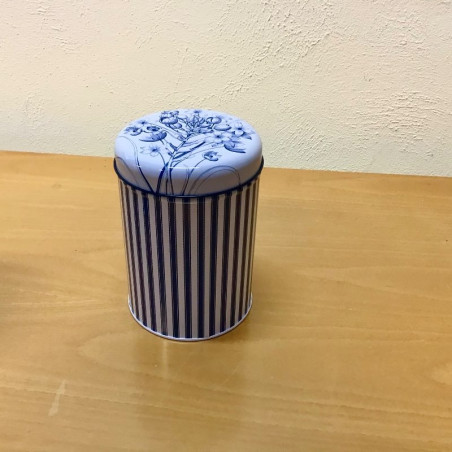 Blå rund metaldåse med striber